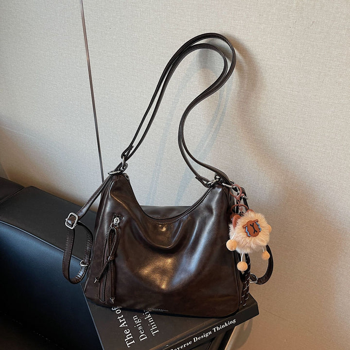 Damen praktische Handtasche mit verspieltem Anhänger Nord Taschen