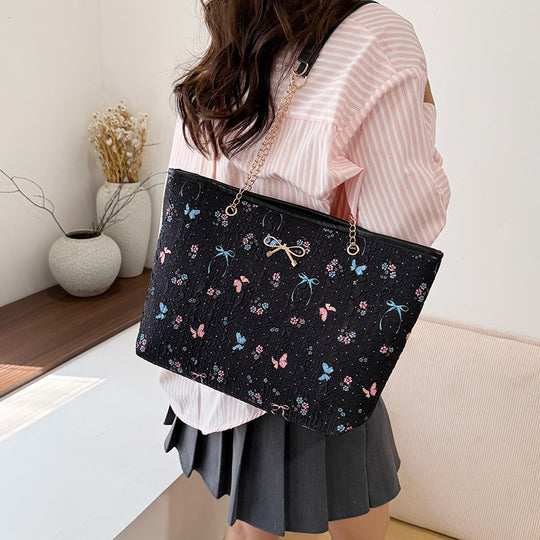 Damen Einkaufstasche mit floralem Design und elegantem Kettenakzent Nord Taschen