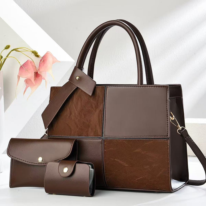 Damen elegante Handtasche mit praktischen Fächern und abnehmbarem Clutch Nord Taschen