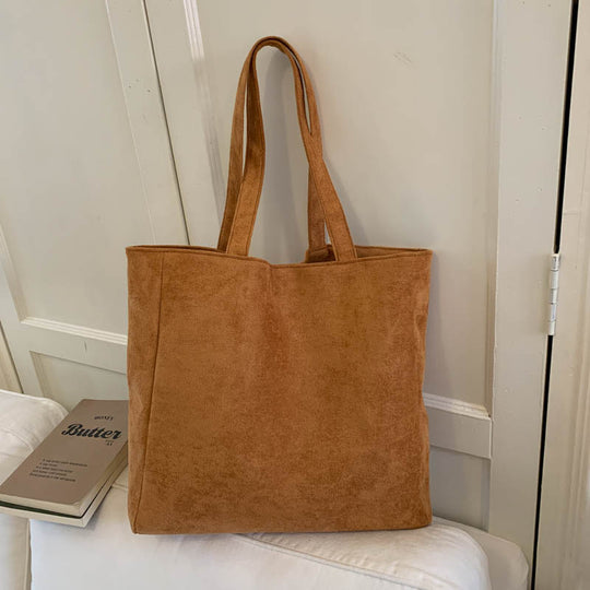 Damen stilvolle Schultertasche aus hochwertigem Wildleder mit süßem Anhänger Nord Taschen