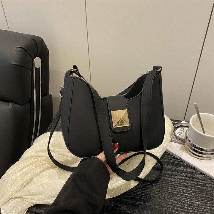 Damen Umhängetasche mit elegantem Verschluss und strukturiertem Design Nord Taschen