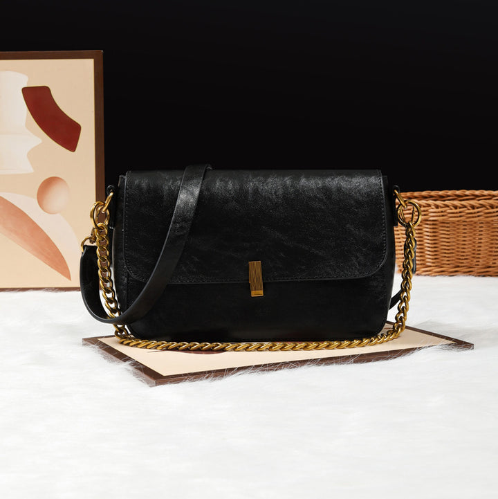 Damen Umhängetasche aus hochwertigem Kunstleder mit elegantem Klappenverschluss Nord Taschen