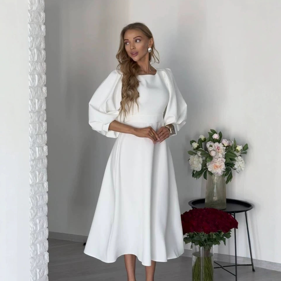 Damen Midikleid mit offenem Rückenausschnitt, voluminösen Puffärmeln und Bindegürtel Nord Taschen