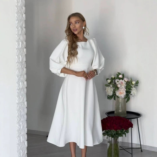 Damen Midikleid mit offenem Rückenausschnitt, voluminösen Puffärmeln und Bindegürtel Nord Taschen