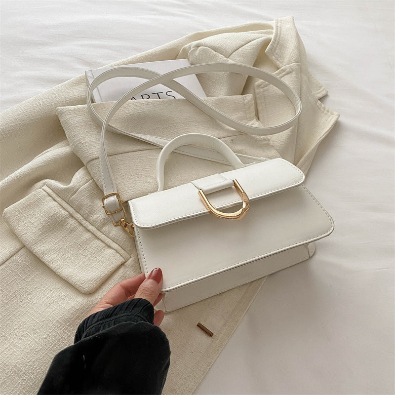Damen elegante Umhängetasche mit strukturierter Oberfläche und goldenen Akzenten Nord Taschen