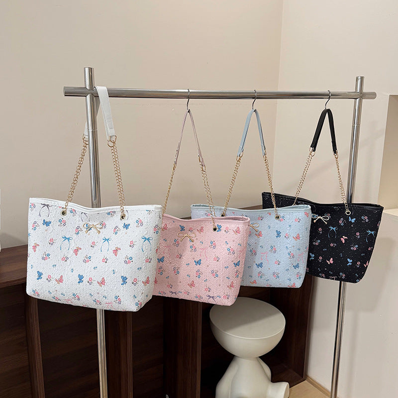 Damen Einkaufstasche mit floralem Design und elegantem Kettenakzent Nord Taschen