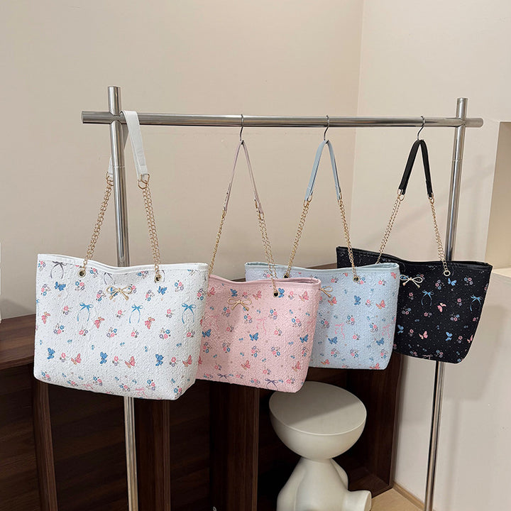 Damen Einkaufstasche mit floralem Design und elegantem Kettenakzent Nord Taschen