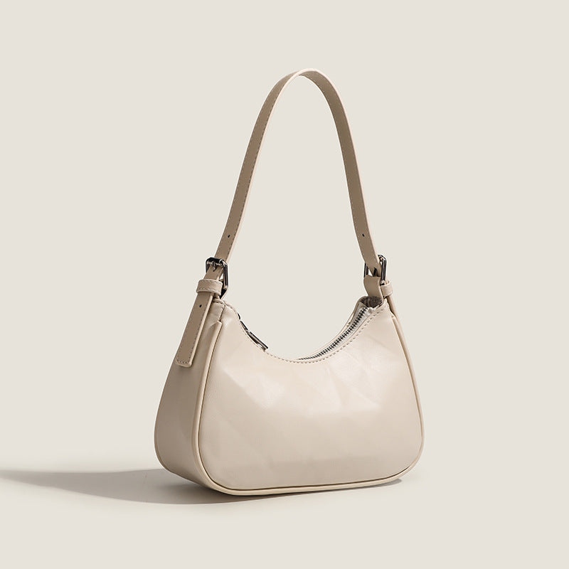 Damen Umhängetasche mit glänzender Oberflächenstruktur und einzigartigem Design Nord Taschen