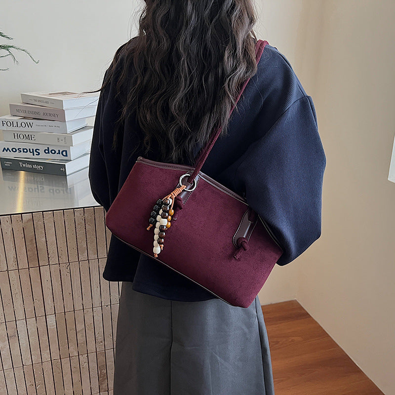 Damen modische Henkeltasche aus weichem Wildleder mit dekorativen Perlen Nord Taschen