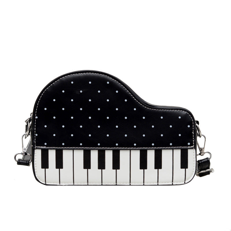Damen Clutch-Tasche mit verspieltem Klavier-Design Nord Taschen