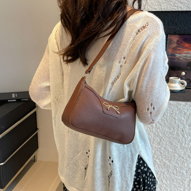 Damen elegante Handtasche mit feinem Schleifendetail Nord Taschen