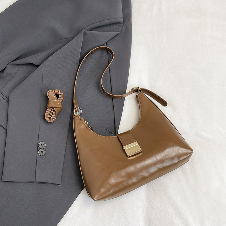 Damen Umhängetasche aus hochwertigem Kunstleder mit elegantem Klappverschluss Nord Taschen