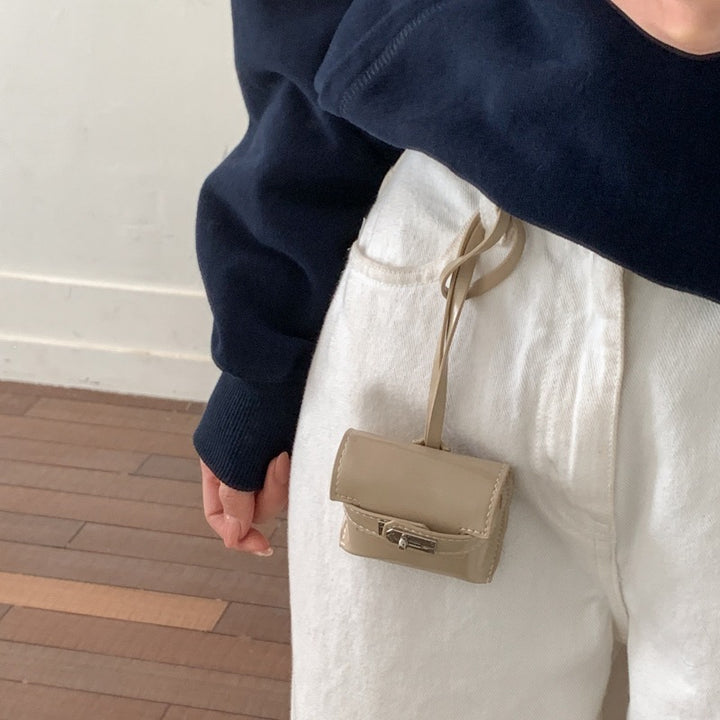 Damen Mini-Handtasche aus hochwertigem Kunstleder mit verspieltem Verschluss Nord Taschen