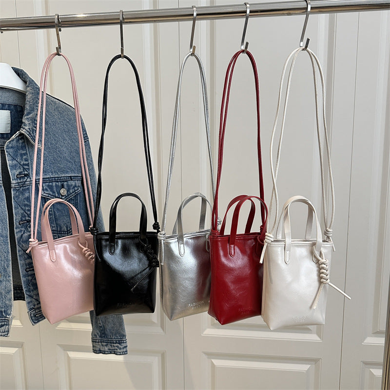 Damen Mini-Handtasche mit innovativem Kordelzug Nord Taschen