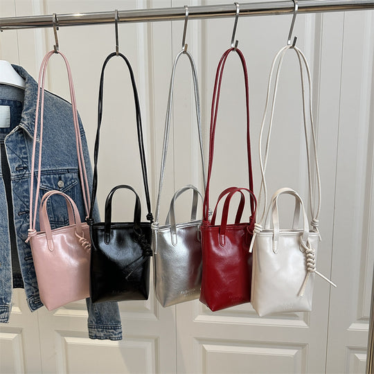 Damen Mini-Handtasche mit innovativem Kordelzug Nord Taschen