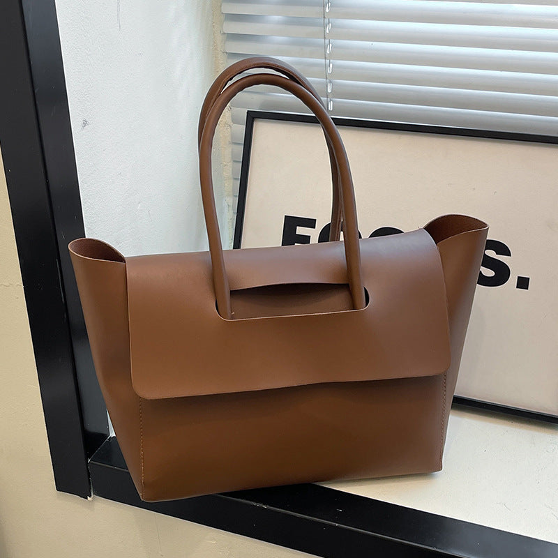 Damen elegante Handtasche aus hochwertigem Kunstleder mit raffiniertem Verschluss Nord Taschen