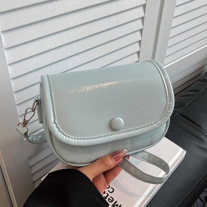 Damen Umhängetasche mit eleganter Klappöffnung und verstellbarem Schultergurt Nord Taschen