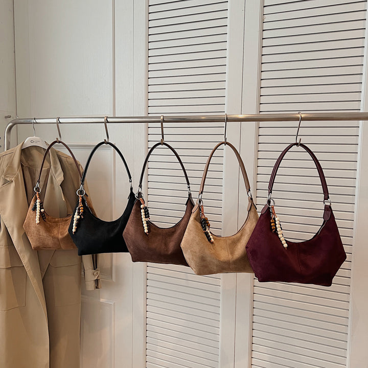 Damen Schultertasche mit eleganter Wildleder-Oberfläche Nord Taschen