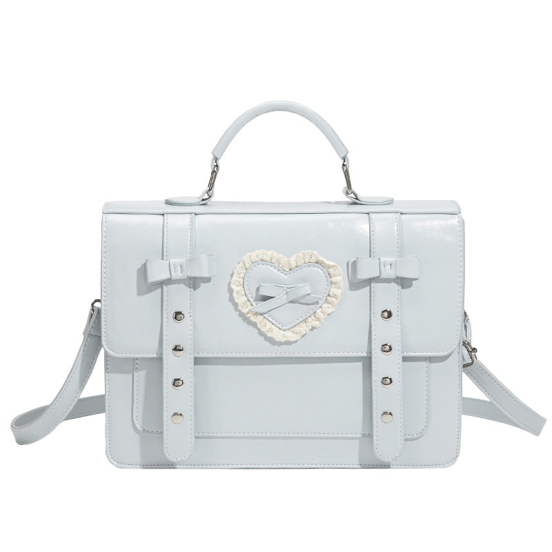Damen Handtasche mit romantischem Herzdesign und verspielten Schleifen Nord Taschen