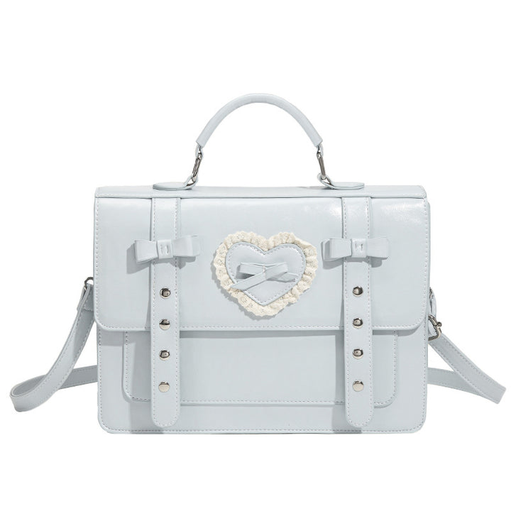 Damen Handtasche mit romantischem Herzdesign und verspielten Schleifen Nord Taschen