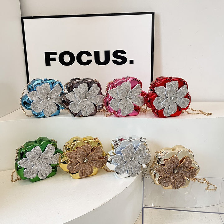 Damen Clutch mit floralem Design und glamourösem Glitzereffekt Nord Taschen