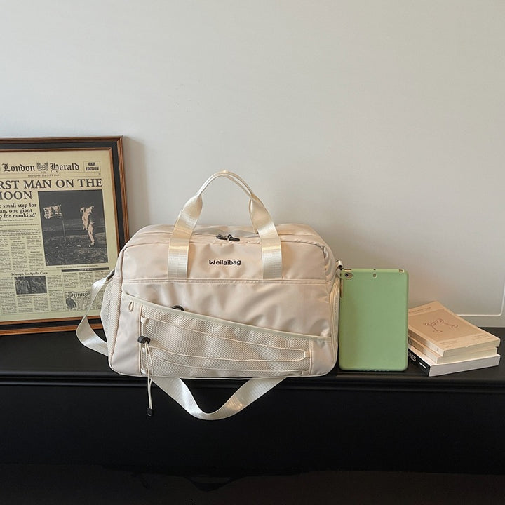 Damen Reisetasche mit praktischen Außentaschen und komfortablem Schultergurt Nord Taschen