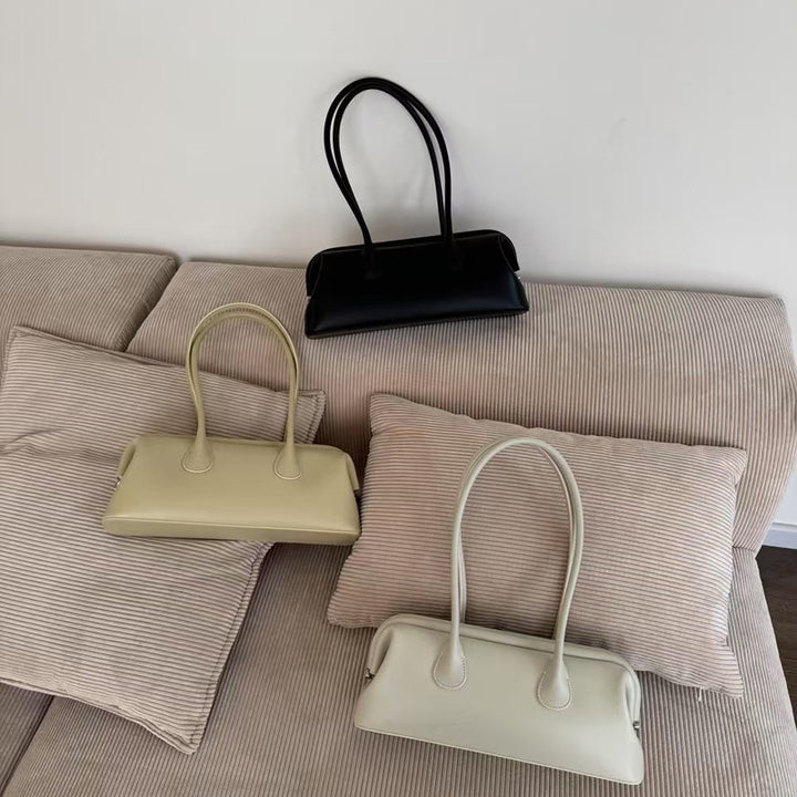 Damen elegante Henkeltasche mit geschmeidigem Kunstleder Nord Taschen