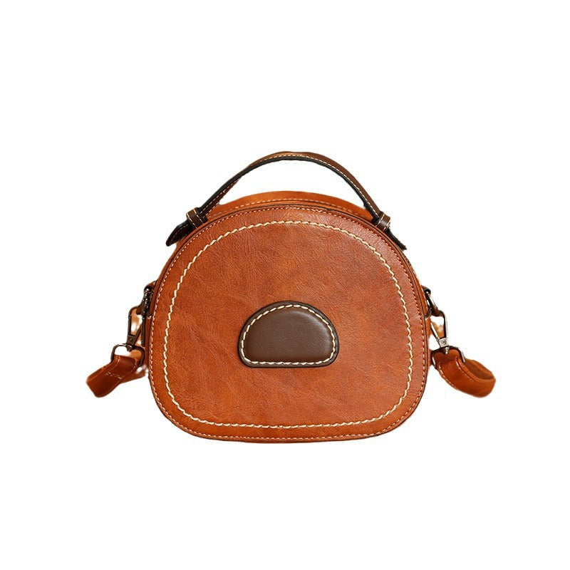 Damen Designer Handtasche mit modernem Rundschnitt und hochwertiger Lederverarbeitung Nord Taschen