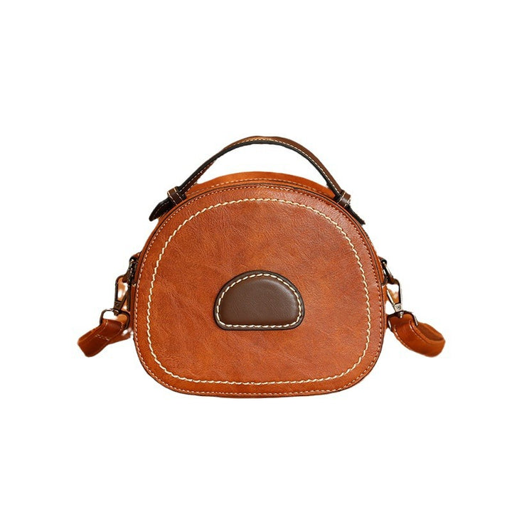 Damen Designer Handtasche mit modernem Rundschnitt und hochwertiger Lederverarbeitung Nord Taschen