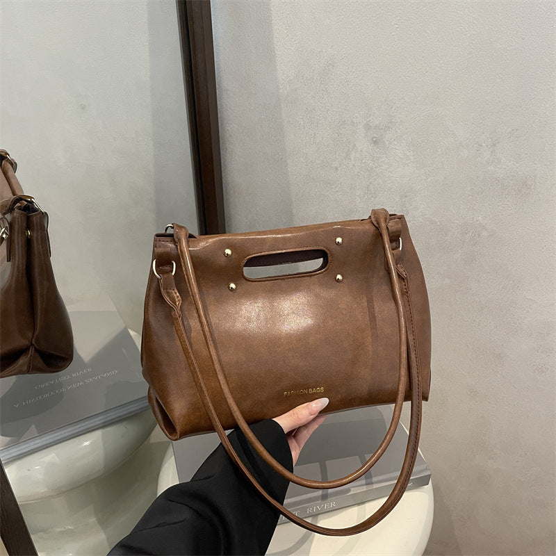 Damen Handtasche mit zeitlosem Design und hochwertiger Lederstruktur Nord Taschen