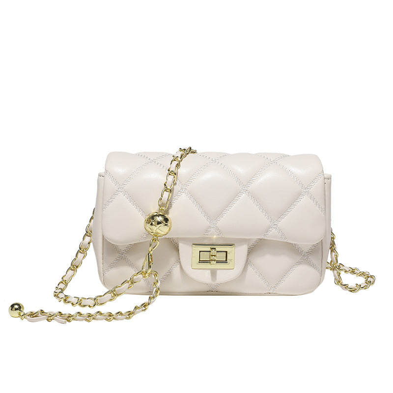 Damen elegante Schultertasche mit stilvoller Steppung und markanten Metallakzenten Nord Taschen