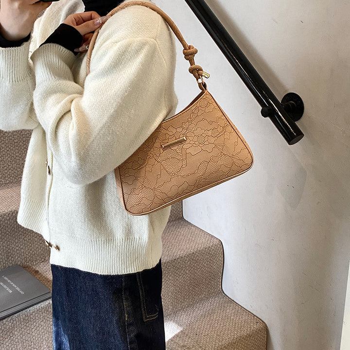 Damen Designer Handtasche mit floralem Relief Nord Taschen
