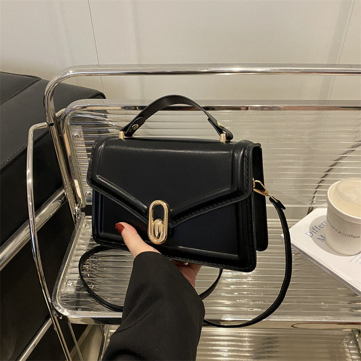 Damen Elegante Handtasche mit goldenen Akzenten Nord Taschen