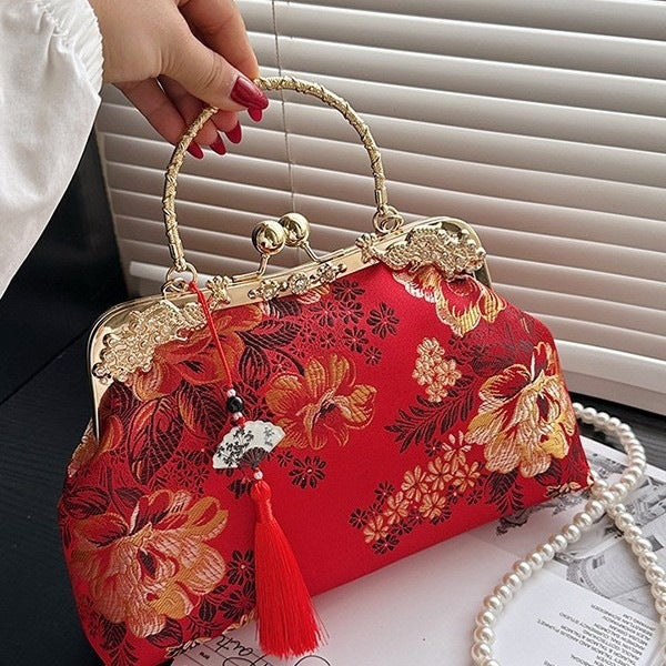 Damen elegante Umhängetasche mit floralem Design und goldenen Akzenten Nord Taschen