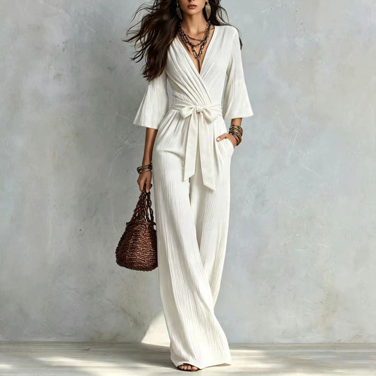 Damen Jumpsuit Wickel-Optik mit weitem Bein, Taillengürtel und Glockenärmeln Nord Taschen