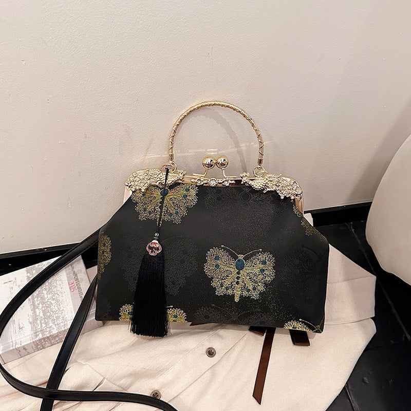 Damen modische Handtasche mit filigranem Schmetterlingsmuster und eleganten Akzenten Nord Taschen