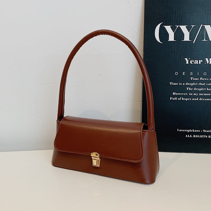 Damen moderne Umhängetasche mit elegantem Klappverschluss Nord Taschen