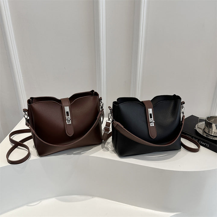 Damen elegante Umhängetasche mit hochwertiger Lederstruktur und modischem Verschluss Nord Taschen