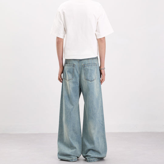 Herren Weit geschnittene Denim-Palazzohose mit geschwungenen Nahtpaneelen und extralangem Saum Nord Taschen