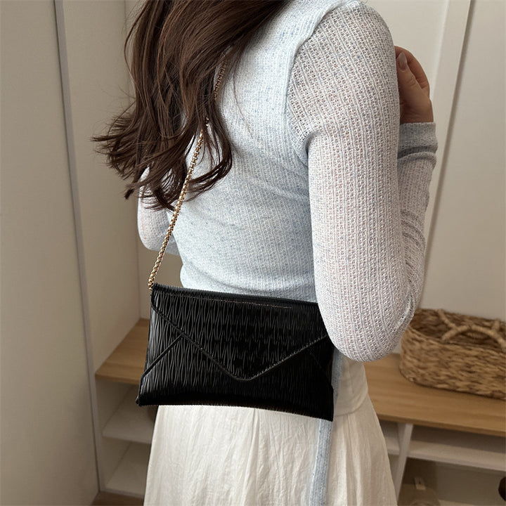 Damen elegante Clutch mit strukturiertem Design Nord Taschen