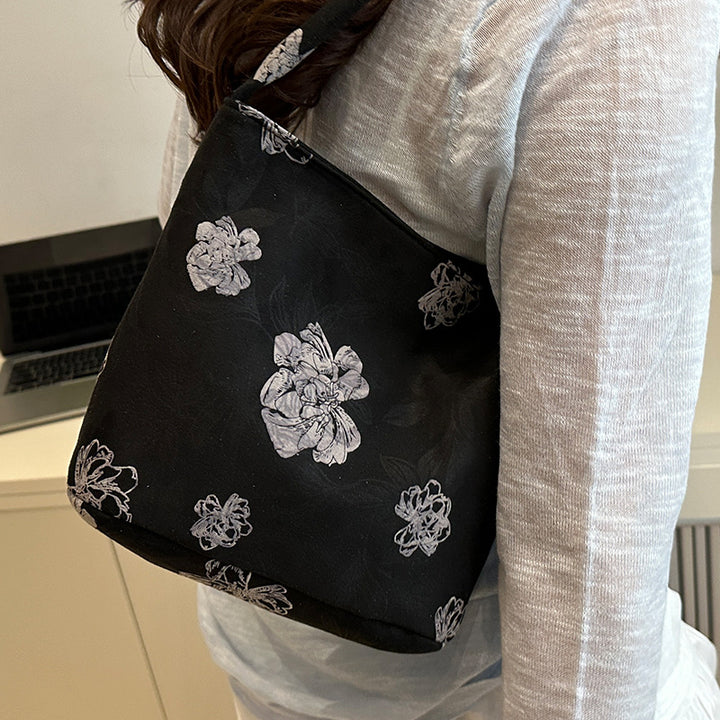 Damen Handtasche mit floralem Design und sanften Akzenten Nord Taschen