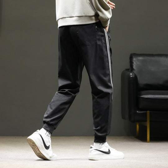 Herren Sportive Jogginghose im Trackstyle mit seitlichen Kontraststreifen, Tunnelzug und elastischen Bündchen Nord Taschen
