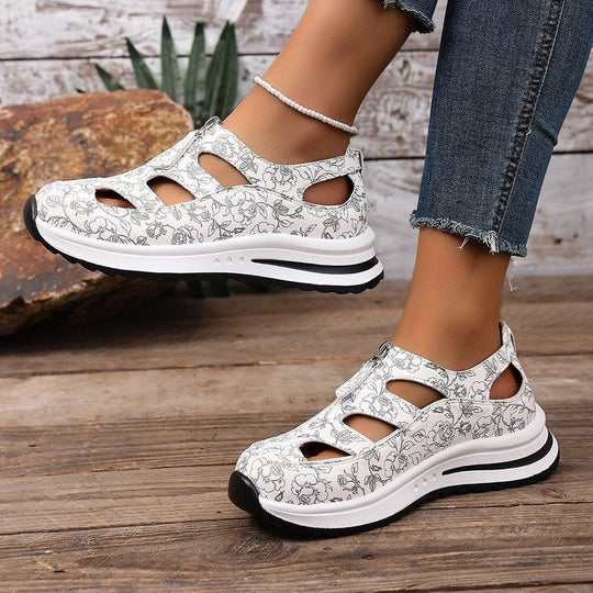 Damen Sandalen mit floralen Ausschnitten und komfortabler Sohle Nord Taschen