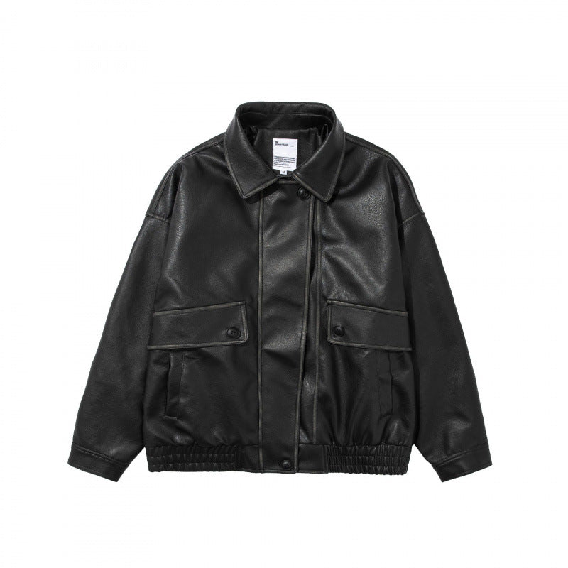 Unisex Kurz geschnittene Oversized Kunstleder-Blousonjacke mit Hemdkragen, Pattentaschen und elastischem Saum Nord Taschen
