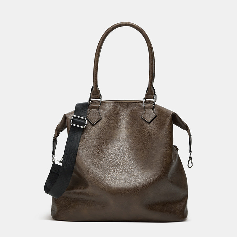 Damen Handtasche mit verstellbarem Schulterriemen und eleganter Lederstruktur Nord Taschen