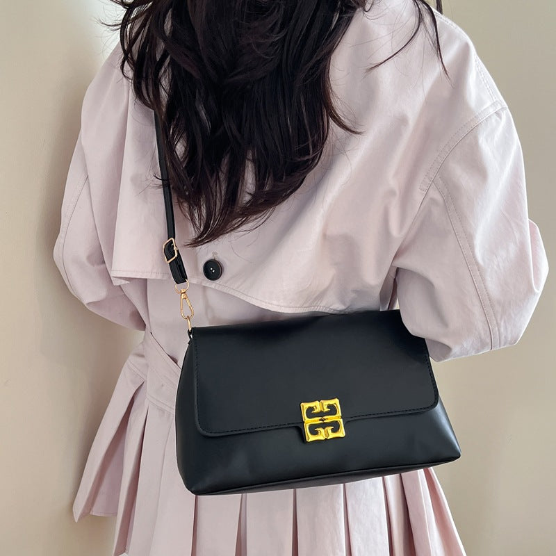 Damen Umhängetasche mit elegantem Klappverschluss und luxuriösen Details Nord Taschen