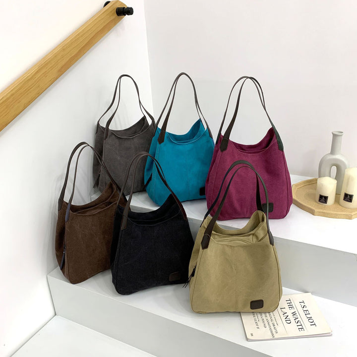 Damen Schultertasche aus strapazierfähigem Canvas mit eleganten Lederakzenten Nord Taschen