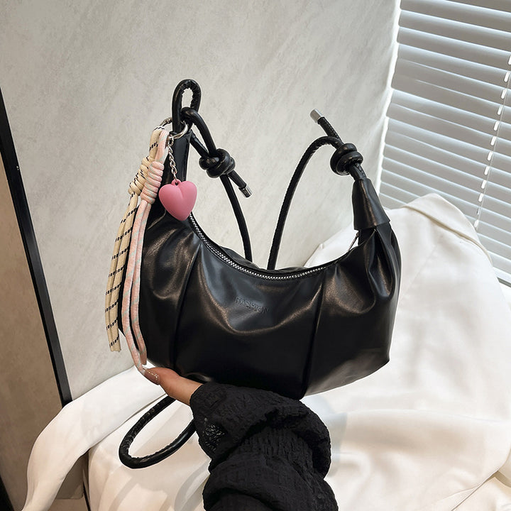 Damen Handtasche mit einzigartigem Kordelzugdesign und verspieltem Anhänger Nord Taschen