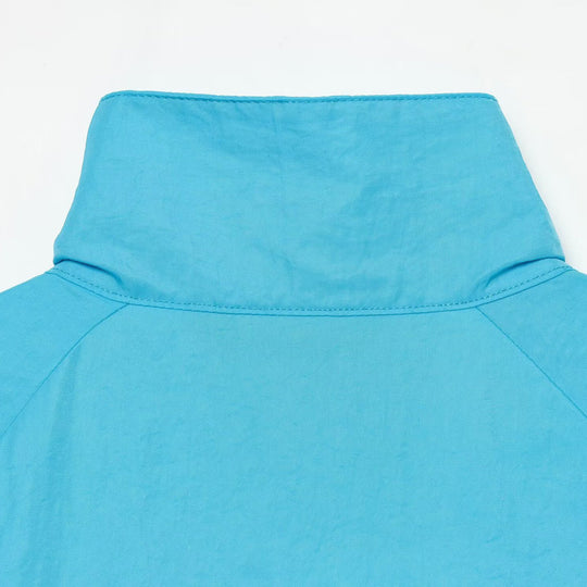 Damen Ultraleichte Cropped-Windjacke mit Stehkragen, Raglanärmeln und Reißverschluss Nord Taschen