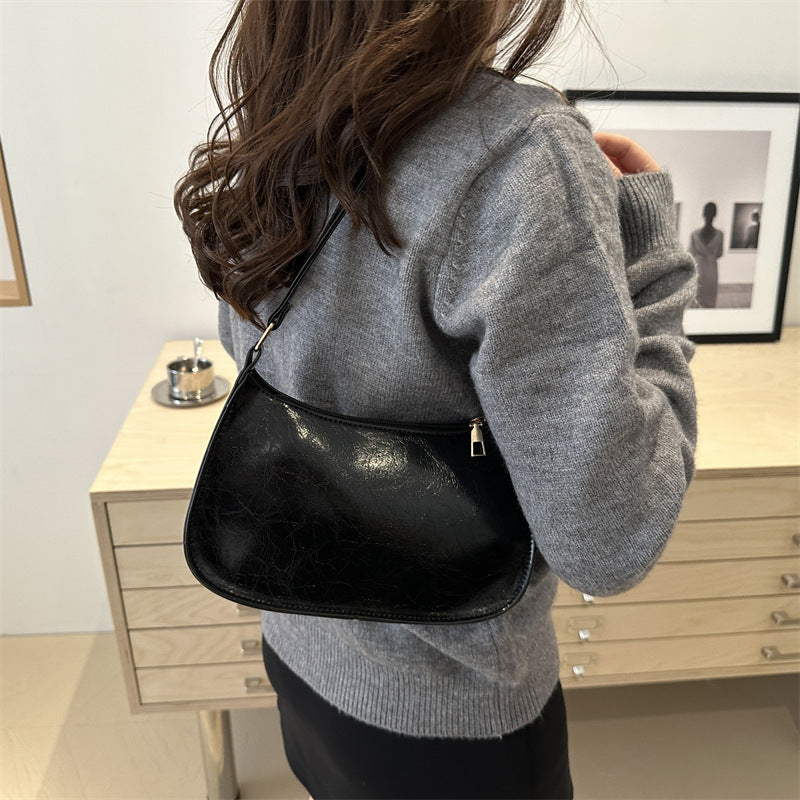Damen elegante Umhängetasche aus veganem Leder mit minimalistischer Form Nord Taschen